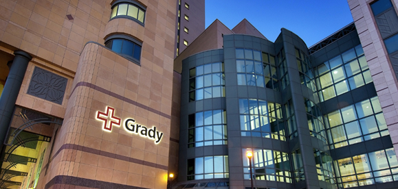 exterior photo of Grady Memorial Hospital at dusk